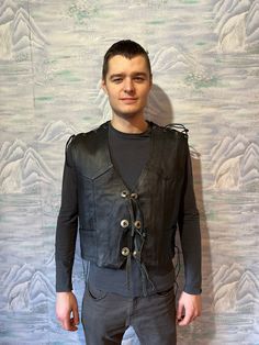 "Vintage Oppened Mens Black Leather Vest Rocker Leather Waistcoat Western Biker Rocker ASPIRIN RIDER Vest Extra Large Size Adjustable Vest Label size: XL Estimated size: M - XL Measurements: (lying flat) Length - 22,5\" / 57 cm Pit to pit: 22,5\" / 57 cm (adjustable) Waist - 22,5\" / 57 cm (adjustable) Please check measurements to insure a proper fit. Remember to allow yourself some extra room for movement. You can compare these with something from your closet that fits you well. This vest will Rocker Leather Outerwear For Alternative Fashion, Gothic Leather Outerwear For Biker Events, Biker Style Leather Outerwear For Alternative Fashion, Black Biker Leather Jacket For Concert, Black Biker Outerwear For Halloween, Black Biker Outerwear For Concerts, Black Gothic Leather Jacket For Biker Events, Black Rocker Style Outerwear For Halloween, Black Rocker Outerwear For Halloween