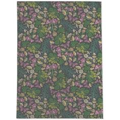 a green and pink flowered wallpaper with leaves on the bottom half of it