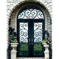 double iron door with transom and matte black frame Mediterranean Front Doors, Pintu Ganda, Wrought Iron Entry Doors, Colorful Doors, Wrought Iron Front Door, Decorative Doors, Traditional Front Doors, Iron Front Door, Iron Entry Doors