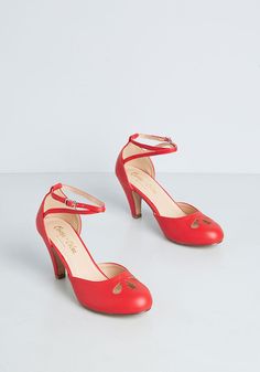 A vintage-inspired beauty, this stylish pair of bright red ankle strap heels are demure and darling ! Made from a friendly faux-leather and perfect for a spin around the dance floor, this pair of retro-fab heels boast dainty teardrop cut-outs at the topline and strappy buckle closure at the ankle. Man-made materials Runs true to size Heel measures 3 inches Adjustable straps Imported | ModCloth Spin Me Right Heels in Red Beige Ankle Strap Heels, Vintage Style Swimwear, Gingham Embroidery, Vintage Inspired Shoes, Cute Red Dresses, Flat Heel Boots, Strappy High Heels, Trendy Summer Outfits, Mary Jane Heels