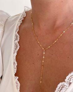 Striking, 14K gold filled lariat necklaces that have a "barely there" delicacy about them. Choose from three dainty chains. All very tarnish resistant and hypoallergenic.  Nickel and lead free. Adjustable 16-18in. Delicate 14k Gold Filled Lariat Jewelry, Dainty Adjustable Lariat Necklace With Clavicle Chain, Delicate 14k Gold Lariat Necklace, 14k Gold Lariat Necklace With Delicate Chain, Dainty Long Drop Jewelry For Layering, Dainty Yellow Gold Lariat Necklace With Long Drop, Adjustable Delicate Drop Necklace With Delicate Chain, Adjustable Delicate Drop Necklace, Adjustable Dainty Drop Necklace For Everyday