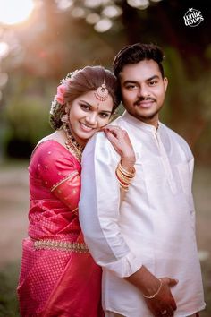 a man and woman posing for a photo