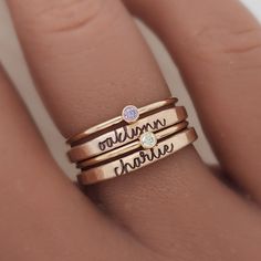 Mother's Day Gift | The Hannah Set This set includes: -Two 14k gold filled or .999 fine silver 2mm personalized rings in our handwriting font -Two 14k gold filled or sterling silver birthstone rings *If you only need 1 of each ring, please use this listing:  https://www.etsy.com/listing/1678500446/mothers-day-gift-cursive-stacking-name?click_key=e92aee2a3d2032f0ebc699c8fe543638ae6ac480%3A1678500446&click_sum=88f2943e&ref=shop_home_active_7&pro=1&frs=1 The Hannah Set is the perfect gift for Mothe Name Rings Gold, Name Rings Personalized, Mothers Jewelry, Stackable Name Rings, Christmas Gift Ideas For Women, Sterling Silver Birthstone Ring, Handwriting Gifts, Handwriting Jewelry, Birthstone Rings