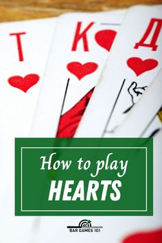 playing cards with the words how to play hearts on them