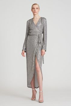 The Falan cocktail dress perfectly captures Halston's iconic ultra-glam feel in its wrap silhouette covered in glistening silver sequins. Halston Dress, Silver Sequin Dress, Long Sleeve Wrap Dress, Midi Wrap Dress, Sequin Cocktail Dress, Long Sleeve Sequin, Nordstrom Dresses, Sequin Dress, Dresses Online