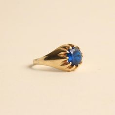 R I N G WITH BLUE SYNTHETIC SPINEL ∙  * Details: Solid Gold ∙ 14K Gold ∙ Yellow Gold * Stones: blue synthetic spinel * Weight: 3.18 grams * Ring size: 7¾ * Condition: All our pieces are vintage, antique or close to new. The piece undergoes a restoration proces, which includes ultrasonic cleaning and mild polish techniques to enhance the condition of the piece. * All our pieces are vintage and handpicked. We put a lot of effort into finding the most unique and beautiful items for you guys ♥️ Hope Formal Blue Sapphire Birthstone Ring, Formal Blue Sapphire Ring With Birthstone, Blue Sapphire Ring Stamped 14k, Classic Royal Blue Sapphire Ring, Vintage Blue Sapphire Round Ring, Vintage Blue Sapphire Ring Stamped 14k, Classic Blue Sapphire Ring, Heirloom 14k Gold Blue Sapphire Ring, Timeless Blue Sapphire Ring In 14k Gold