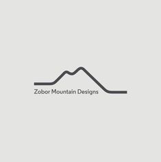 a mountain with the word zobr mountain designs written in black and white on it