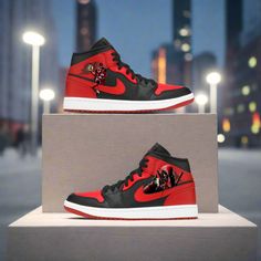 Introducing the "Maximum Effort | Deadpool Jordan 1" – a bold fusion of iconic style and mercenary swagger! These kicks are not just sneakers; they're a statement. Crafted with precision, the vibrant red and black color scheme captures Deadpool's fearless spirit, while the custom artwork showcases the anti-hero in all his glory. Feel the power of maximum effort in every step, as these Jordans offer unmatched comfort and durability. Perfect for fans of the Merc with a Mouth, these shoes are desig Jordan Mid-top Shoes With Red Sole For Streetwear, Dynamic Jordan Mid-top Shoes For Streetwear, Dynamic Mid-top Jordan Shoes For Streetwear, Urban Custom Sneakers With Red Sole For Sports, Urban Sports Sneakers With Red Sole, Urban Style Custom Sneakers With Red Sole For Sports, Urban Custom Sneakers With Red Sole, Maximum Effort Deadpool, Maximum Effort