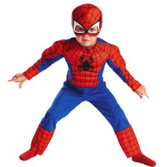 a young boy in a spiderman costume posing for the camera with his hands out