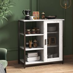 a white cabinet with glass doors and shelves