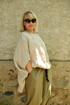 "Linen Tunic Shirt, Women Linen Shirt, Linen Clothing ☆ New collection! Beige 100% LINEN top! Casual linen tunic. Handmade loose shirt. Beige ORGANIC oversize Tunic,Top,Blouse Excellent style for spring and summer! This loose and comfy stylish Kaftan is adding elegant and fashion touch in your everyday life. Perfect solution for your everyday outfit. Be creative and different! ◾Quality NATURAL linen fabric. ◾Fabric: 100% Linen ◾Care: Wash in plenty of cold (+25/+30oC) water Use diluted detergent Casual Beige Tunic Top, Casual Neutral Blouse With Buttons, Neutral Buttoned Tops For Daywear, Neutral Button Top For Daywear, Oversized Beige Tops For Daywear, Neutral Buttoned Tops, Relaxed Fit Lagenlook Blouse For Beach, Oversized Beige Tunic For Summer, Oversized Neutral Casual Blouse