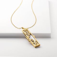 Shown here: Image of the Gold Flowered Vines Fortune opened with a fortune reading “progress, not perfection” with additional fortune in F+F pink envelope Popular Sayings, Unique Locket, Ancient Maps, Mini Envelopes, Jewelry Quotes, Christmas Messages, Mini Frames, Meaningful Messages, Meaningful Jewelry