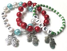 Christmas Stocking Stuffer for kids. Personalized Name Bracelet with a Holiday, Christmas theme. Personalize with name, phone number, or medical alert info. Great Party Favor or gift! This beautiful bracelet is made with high quality glass pearl beads and a silver tone snowflake charm. I hand string each order individually with care. You can personalized the name and bead color and bead type. ORDER INFO - In the personalization box please include the name and bead colors desired. You will be pro Kids Christmas Stocking, Personalized Stocking Stuffers, Bracelets For Kids, Personalized Stocking, Bracelet Christmas, Stocking Stuffers For Kids, Personalized Stockings, Holly Berry, Christmas Bracelet