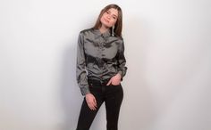 "Vintage 90s metallic blouse. A classic minimalist piece from the 90s. Slightly fitted silhouette. Long sleeves with button cuff. Classic shirt collar. Gunmetal silver metallic fabric. Front button fastening. Unlined. We kindly ask that you please view all measurements for comparison so you can get your desired fit. * Brand: Gap * Decade: 1990s * Fabric: 55% Rayon, 42% Nylon, 3% Spandex * Lining: Unlined * Color: Gunmetal Silver C O N D I T I O N Excellent vintage condition, minimal pre-wear; no Minimal Dress, Metallic Blouses, Romantic Blouses, Sweater Fits, Elegant Blouses, Metallic Fabric, Fitted Silhouette, Puff Sleeve Top, Boho Blouses