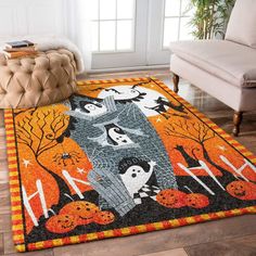 a halloween themed area rug with ghost and pumpkins