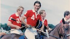 three men in red and white uniforms are riding horses with polo sticks on their backs