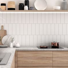 a kitchen with wooden cabinets and white tile backsplash, counter tops and shelves