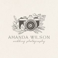 the logo for amanda wilson wedding photography, which has been designed to look like an old camera