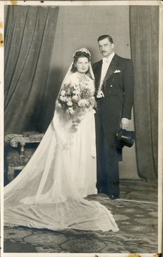 an old black and white photo of a bride and groom