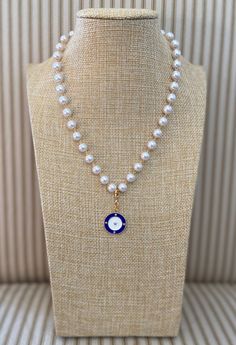 "Classic and Modern all in one!   8mm pearl strand with removable pendant.  The pendant is a gorgeous 14k Gold Filled blue and white enamel disc with a star center and 4 CZs.   Two looks, one necklace!  Necklace has a lobster clasp.   Lightweight and easy to wear.    Wear alone or layer with your other pieces. Pearl strand is 17\" long.  Charm drops another 1.5\".   I can shorten or lengthen on request.   Listing is for pendant necklace only.  Other photos show layering ideas.  Packaged in a silk pouch. For any questions regarding this piece or our collection please reach out. We love talking to our customers! FREE SHIPPING OVER $35.00" Layering Ideas, Ocean City Nj, Pearl Strand, Necklace Necklace, Pearl Strands, Ocean City, Enamel Charms, White Enamel, Pendant Necklaces