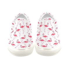 a pair of white shoes with pink flamingos on them