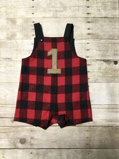 "PLEASE INCLUDE IN MESSAGE TO SELLER THE DATE NEEDED. Shipping time frame is around 2-3 weeks when the outfit will be shipped out. If you have questions about shipping time please message me. This is the perfect outfit for a Lumberjack themed first birthday. The jon jon is made from a soft buffalo plaid flannel fabric. The straps have 2 snaps so size can be adjusted. Size chart 0-3 months 7-13 lbs 17-24\" height 6-9 months 13-18lbs 24-26\" height 12-18 months 18-21lbs 26.5-31\" height 18-24 mont Lumberjack 1st Birthday, Woodland First Birthday, Lumberjack First Birthday, Plaid Flannel Fabric, Boys First Birthday, Themed First Birthday, Buffalo Plaid Flannel, 1st Birthday Themes, Birthday Boys