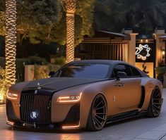 a car parked in front of a house with palm trees and lights on it's side