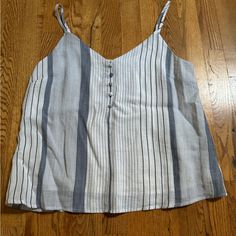 Skies Are Blue Stripe Camisole Tank Size Small Never Worn Coastal Cowgirl Aesthetic Adjustable Straps Feels Like Linen Casual Tank Strap Top For Beach, Casual Beach Tops With Tank Straps, Casual Tank Top For Beach, Blue Casual Tops With Tank Straps, Casual Blue Camisole Tank Top, Casual Blue Tops With Tank Straps, Cotton Tank Top With Straps For The Beach, Casual Beach Camisole With Tank Straps, Casual Camisole With Tank Straps For Beach