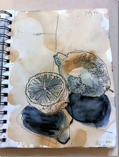 an art journal with watercolors and ink on paper, containing a piece of fruit