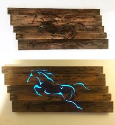 two pieces of wood that have neon lights on them, one of which has a horse drawn on it