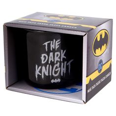 the dark knight coffee mug is in its box