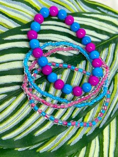 This bubbly set is so cheerful and colorful. The pinks and blues remind us of sticky cotton candy fingers! All 4 bracelets come as shown, all are stretchy and fit most all wrists comfortably. Playful Blue Beaded Bracelets For Summer, Fun Blue Beaded Bracelets For Summer, Blue Beaded Bracelet Fun Style For Summer, Fun Pink Stretch Bracelet With Colorful Beads, Fun Blue Beaded Bracelets, Playful Blue Beaded Bracelets, Pink Casual Stretch Bracelet For Spring, Trendy Pink Hypoallergenic Stretch Bracelet, Playful Pink Stretch Bracelet For Summer