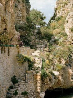 stairs lead up to the top of a cliff