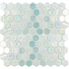 a white and blue mosaic tile pattern with hexagonals on the bottom half