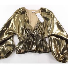 Rhode Gold Xs Party Peplum Blouse For Fall, Peplum Blouse For Fall Party, Fall Party Peplum Blouse, Spring Evening Peplum Top, Fall Peplum Blouse For Night Out, Elegant V-neck Peplum Top For Fall, Elegant Fall V-neck Peplum Top, Fall Elegant V-neck Peplum Top, Chic Metallic V-neck Top