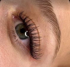 a woman's eye with long lashes