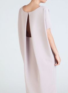 KAAREM - Triangle Midi Dolman Open Back Dress - Cream Oversized Silk Elegant Dresses, Oversized Elegant Silk Dress, Chic Evening Dresses With Button Back, Chic Evening Dress With Button Back, Chic Daywear Dress With Pleated Back, Elegant Draped Daywear Dresses, Elegant Draped Midi Dress For Daywear, Chic Draped Midi Dress With Pleated Back, Chic Cape Dresses For Spring