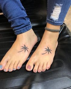 two palm trees tattoo on both feet