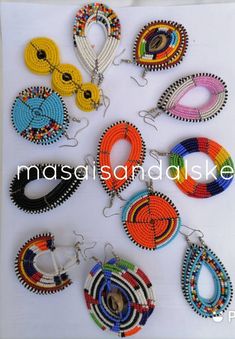 Setof 12 wholesale earrings Go ethnic with our African Maasai tribal earrings skillfully made with passion and ancient jewelry making tradition of the Maasai people of Africa Festival Jewelry With Round Beads And Ear Wire, Traditional Assorted Jewelry As A Gift, Traditional Assorted Jewelry For Gift, African Wedding Jewelry, Maasai People, Leather Beaded Necklace, Red Bead Earrings, Wholesale Earrings, African Earrings