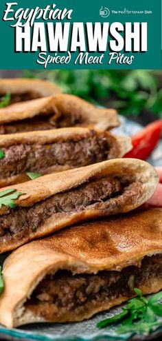 three pita breads on a plate with peppers and parsley in the background