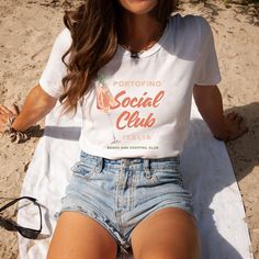 Yay! We're so glad you're here! Get ready for some Sweet Sanity in your life! This shirt is the cutest way to emit all those vintage beachy vibes! ♥ DETAILS: - Our tshirts are printed on classic jersey tees, so they are super soft and comfy. - Unisex tee, short sleeves, crewneck. (see sizing help below!) - 100% airlume combed and ringspun cotton. - Tear away label. ♥ CARE INSTRUCTIONS - Machine wash cold, inside-out, gentle cycle. - Tumble dry low or hang-dry. - Do not dry clean. - Do not iron. ♥ SIZING: These shirts are unisex size, not women's fitted shirts. If you want to go with the oversized look go up! If you'd like a more fitted look, we suggest that you size down. To get your size, lay your favorite shirt at home flat, measure armpit to armpit, and then compare to the size chart in Cute Custom Print Shirt For Summer, Cute Custom Print Summer T-shirt, Cute Summer T-shirt With White Print, Summer White Letter Print Shirt, Cute White Print T-shirt For Summer, Custom Print White T-shirt For Summer, Italia Shirt, Coastal Aesthetic, Beachy Vibes