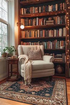 a chair in front of a bookshelf filled with lots of books and lights