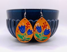 Vibrant, bold earrings which will definitely make a statement! These unique hand-painted wood earrings have a lot of fun, colorful details which can work with many outfits. This statement piece is perfect for a dressy party as well as casual brunch with your crew :) Fun Hand Painted Blue Earrings, Fun Blue Hand Painted Earrings, Dutch Tulips, Flowers Painted, Bold Earrings, Blue Gifts, Hand Painted Wood, Wooden Earrings, Wood Earrings