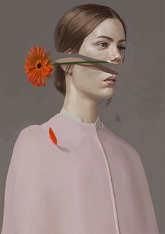 a woman with an orange flower in her hair and a piece of paper taped to her face