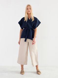 "ELI is a short sleeve linen kimono jacket. DETAILS - Kimono style - Self tie belt - Short sleeve - 100% lightweight European linen fabric - Cut and sewn to order just for you in our studio COLOR - Navy Blue, you can also choose other colors above - Fabric samples are available here https://www.etsy.com/listing/586569696/linen-fabric-samples SIZING & FIT - Relaxed fit - Length (shoulder to hem) is approximately 26 inches / 66 cm - Bust (pit to pit) is approximately 25.5 inches / 65 cm - Slee Casual Linen Kimono With Kimono Sleeves, Chic Workwear Kimono With Kimono Sleeves, Chic Kimono With Kimono Sleeves For Work, Spring Workwear Kimono With Kimono Sleeves, Spring Workwear Kimono, Gray Kimono, Kimono Wrap Top, Linen Camisole, Kimono Style Tops