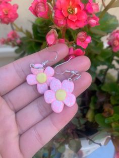 Cute flower earrings made out of polymer clay. Glazed and finished with a key ring attached to fish hook earrings with a backing. Perfect for spring! Polymer Clay Rings Diy, Clay Key Ring, Polymer Clay Rings, Taco Earrings, Clay Flower Earrings, Polymer Clay Ring, Rings Diy, Clay Rings, Clay Flower