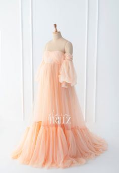 Bringing elegance to motherhood 💕 Our maternity gowns are designed to make you feel beautiful and confident during one of life's most precious moments. *Skirt Lining: Satin Elegant Maternity Flowy Gown, Elegant Spring Maternity Gown, Elegant Flowy Maternity Gown, Elegant Maternity Tulle Gown, Flowy Peach Maxi Dress For Wedding, Elegant Tulle Maternity Gown, Flowy Peach Dress For Wedding, Skirt Lining, Maternity Gown