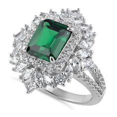 Top of Ring Height: 24.5mm

Top of Ring Width: 22.4mm

Shank Width: 2.4mm


Stone Material: Emerald Cubic Zirconia
Clear Cubic Zirconia

Stone Size: 8.0mmx10.0mm(Emerald)
2.5mm(Princess)
2.0mmx4.0mm(Marquise)
2.5mm(Round)
1.5mm(Round)

Stone shape: Emerald
Princess
Marquise
Round

Stone Carat Weight: 3.79 ct.
0.1 ct.
0.1 ct.
0.06 ct.
0.015 ct.

Total Number of Stones: 77

Stone Setting: Prong


Metal: 925 Sterling Silver

Plating: Rhodium

Finish: High Polish Dazzling Emerald Cut Cubic Zirconia Halo Ring, Formal Green Cubic Zirconia Halo Ring, Dazzling Cubic Zirconia Emerald Ring For Anniversary, Green Cubic Zirconia Cluster Promise Ring, White Gold Emerald Ring With Cubic Zirconia Accents, Elegant Green Cubic Zirconia Cluster Ring, Green Dazzling Rings For Formal Occasions, Dazzling Green Rings For Formal Occasions, Formal Green Dazzling Rings