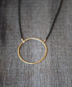 Large (28mm) hand hammered and polished circle on delicate but sturdy chain.  A classic design great for simple styling and a go to layering piece.The circles are gold filled or sterling silver for durability and a long life with you, they are not gold plated or vermeil.  Create the style combo just right for you in the pull down menu.Chain options: GF: gold filled, SS: sterling silver, BLK: ruthenium coated silver Gold Circle Necklace, Station Necklace, Black Chain, Circle Necklace, Silver Pieces, Long Life, Pure Silver, Fine Silver, Necklace Gold