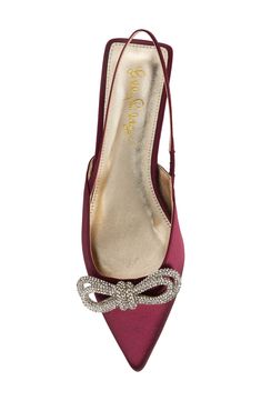 Rich satin and a sparkly rhinestone bow lend a luxe look to this pointy-toe flat secured with a stretchy slingback strap. Textile upper/synthetic lining and sole Imported Elegant Flat Slingback Pumps With Removable Insole, Elegant Flat Slingback Pumps With Heel Strap, Pointy Toe Flats, Slingback Flats, Rhinestone Bow, Womens Flats, Lilly Pulitzer, Cherry, Nordstrom